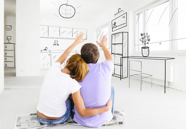 couple at their new empty apartment