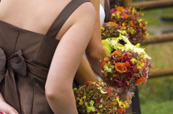 Bridesmaids and Fall Flower Bouquet at the Wedding Ceremony