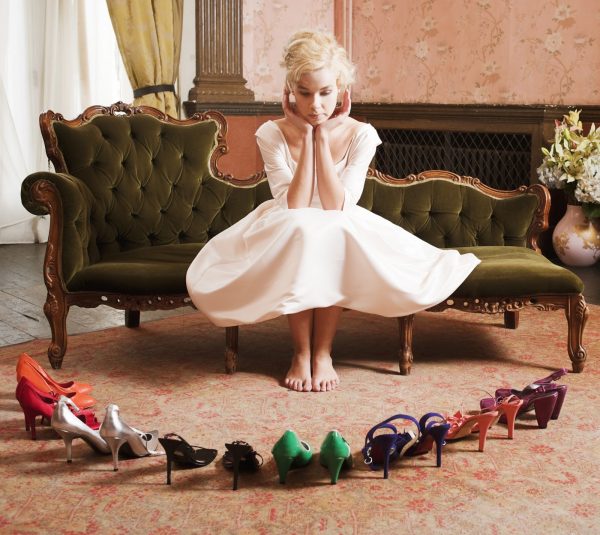 Beautiful, Stylish Woman Choosing Shoes