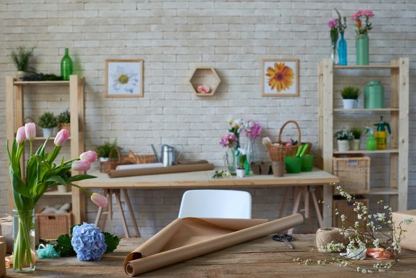 Cozy florist's workshop with various flowers