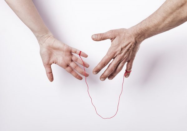 Woman and man with red string of fate