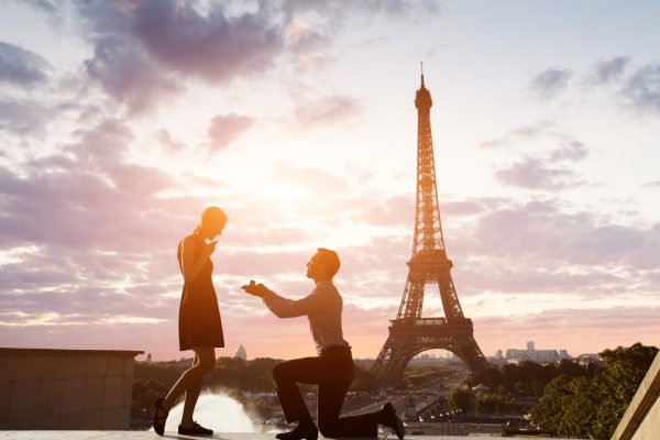 Romantic marriage proposal at Eiffel Tower, Paris, France