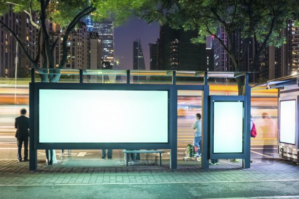 blank advertising screen on the bus station at night in guangzhou